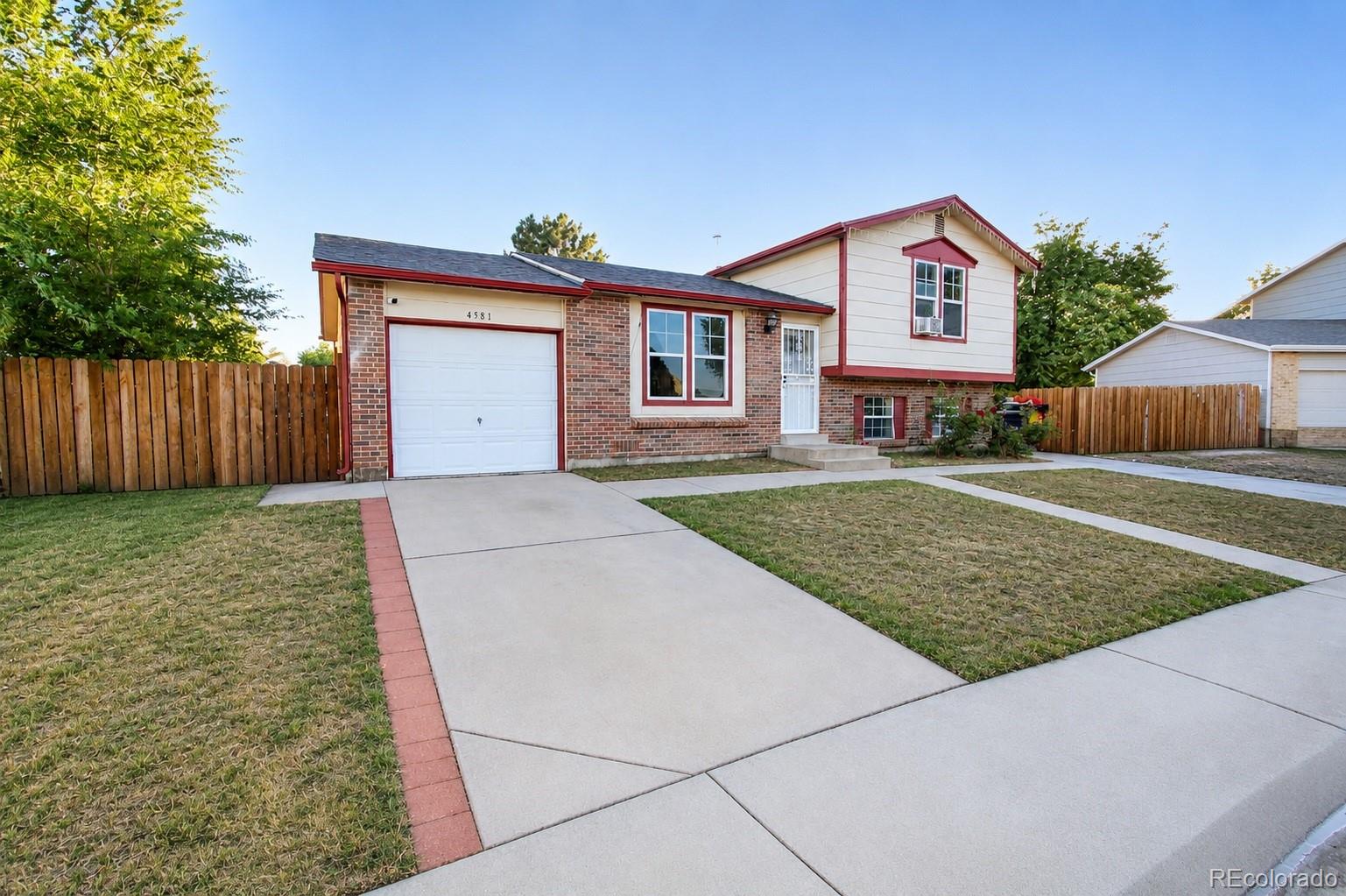 4581 Fraser Way Denver, CO 80239 - Photo 1 of 19