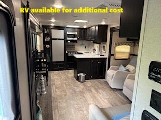 55 Boca Chica Road, Unit 47 Key West, FL 33040 - Photo 11 of 19 a bathroom with a sink and mirror with bathtub