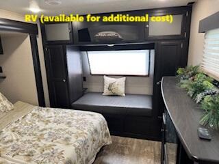 55 Boca Chica Road, Unit 47 Key West, FL 33040 - Photo 12 of 19 a bedroom with a bed and a potted plant