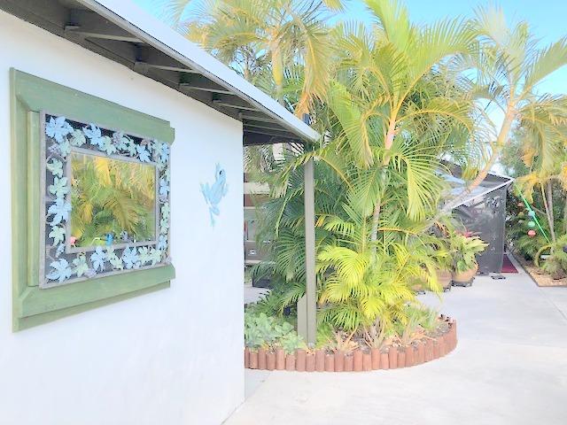55 Boca Chica Road, Unit 47 Key West, FL 33040 - Photo 7 of 18 a white vase with flowers on it