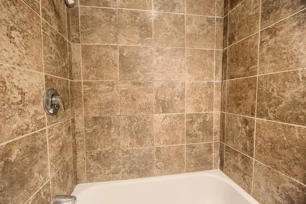 a bathroom with a bathtub