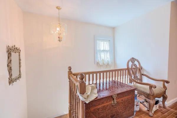 a view of a bedroom with a window