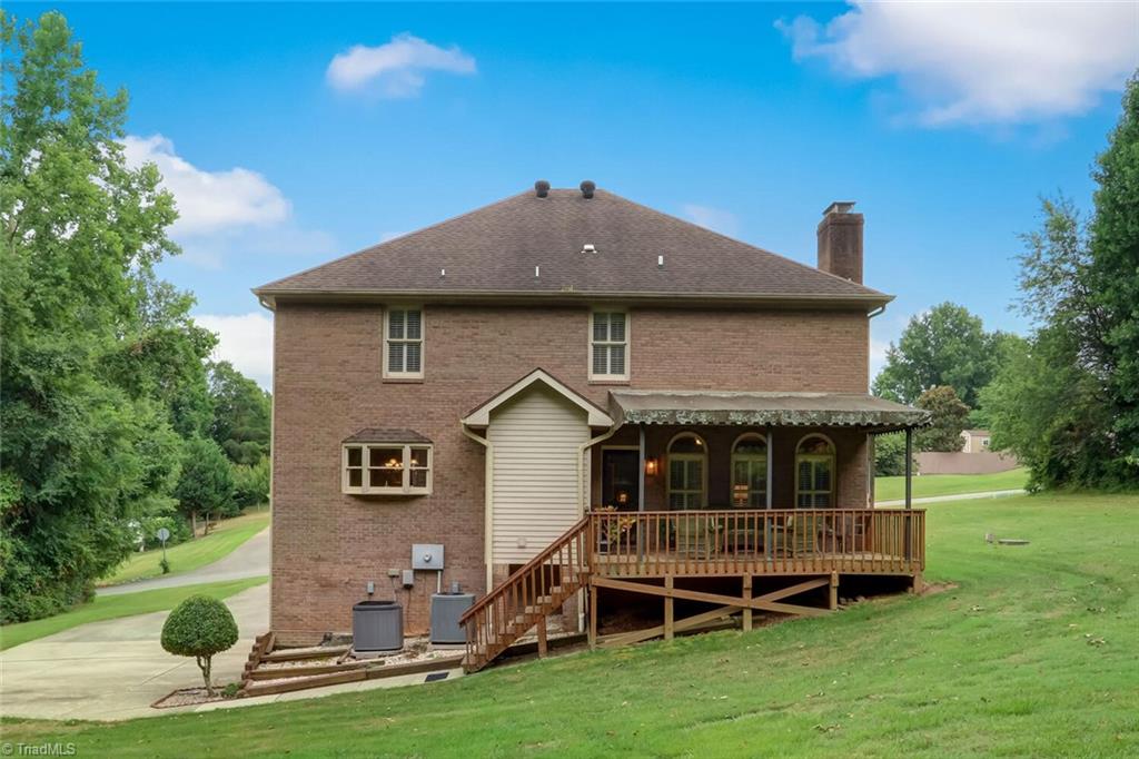 8200 Brittains Field Road Oak Ridge, NC 27310 - Photo 35 of 38 REAR VIEW OF HOME