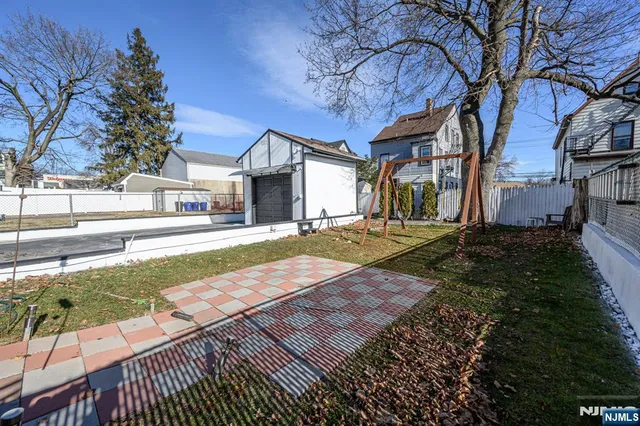 a view of a backyard with a patio