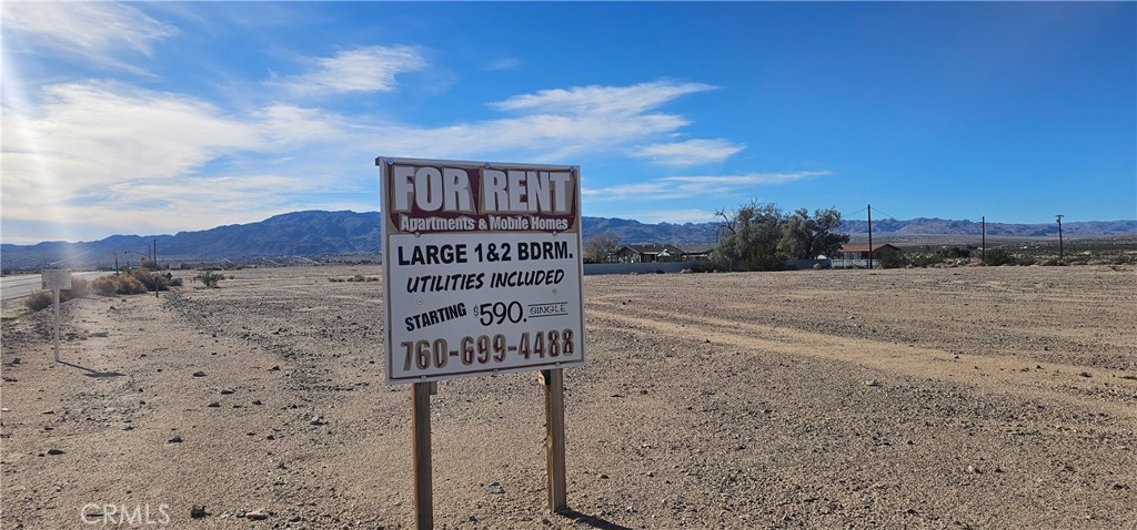 a sign that is on the side of a road
