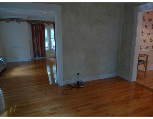 53 Rockland Street Springfield, MA 01118 - Photo 9 of 17 a view of a livingroom with wooden floor