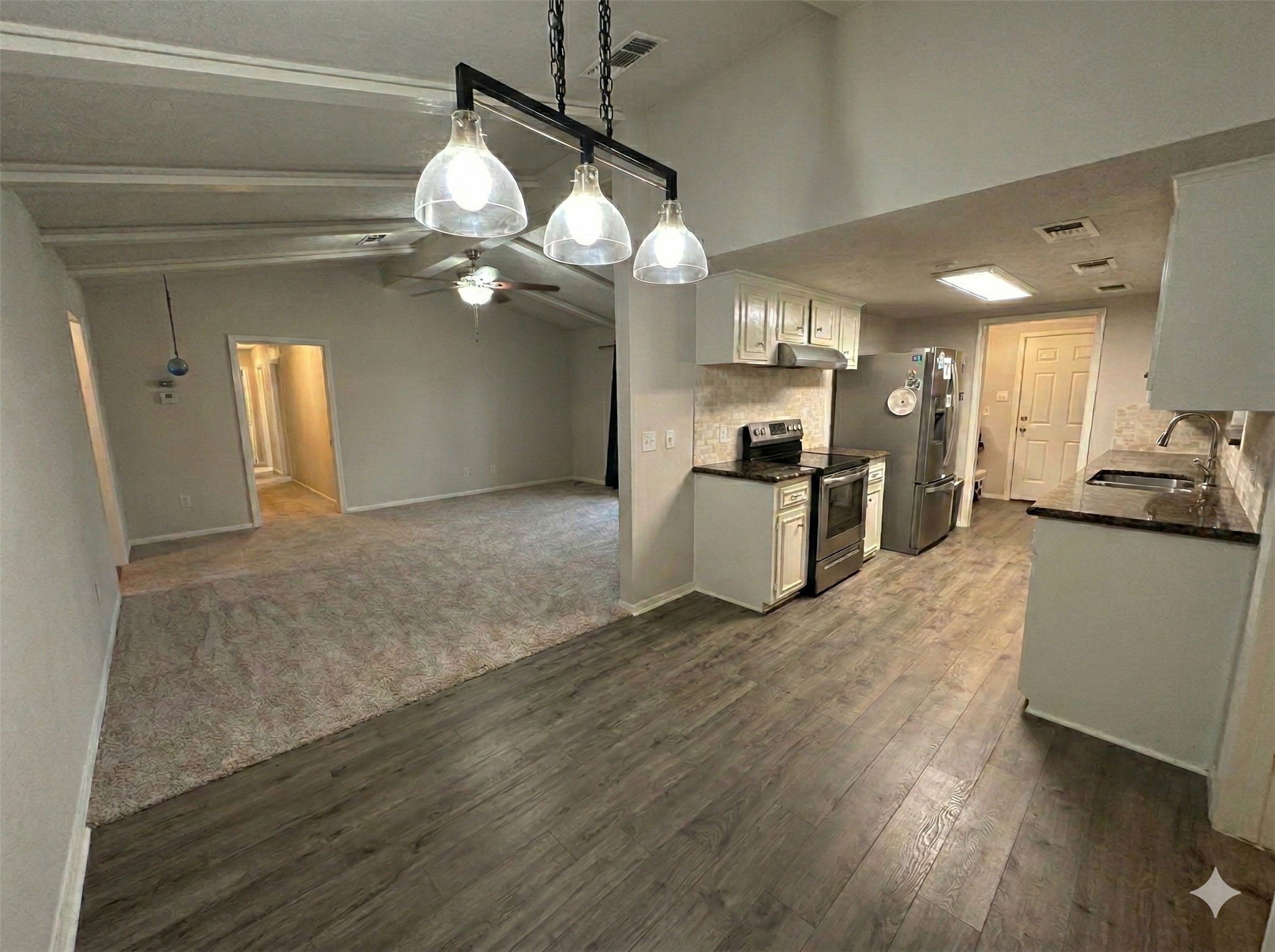 206 Verna Street Jasper, TX 75951 - Photo 8 of 29 Breakfast space leading into living room
