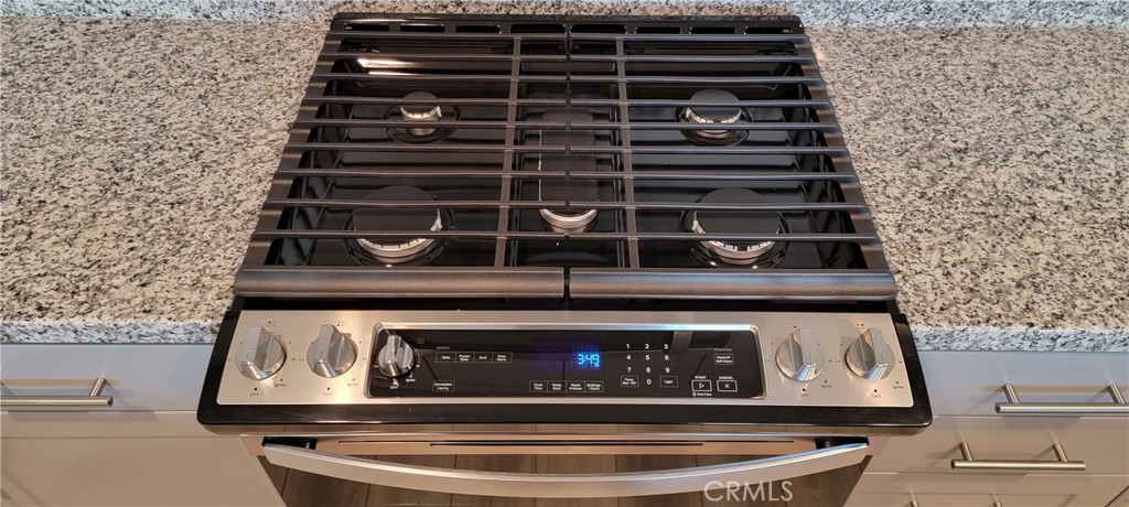 32916 Earlsburn Circle Menifee, CA 92584 - Photo 14 of 34 a close view of stove