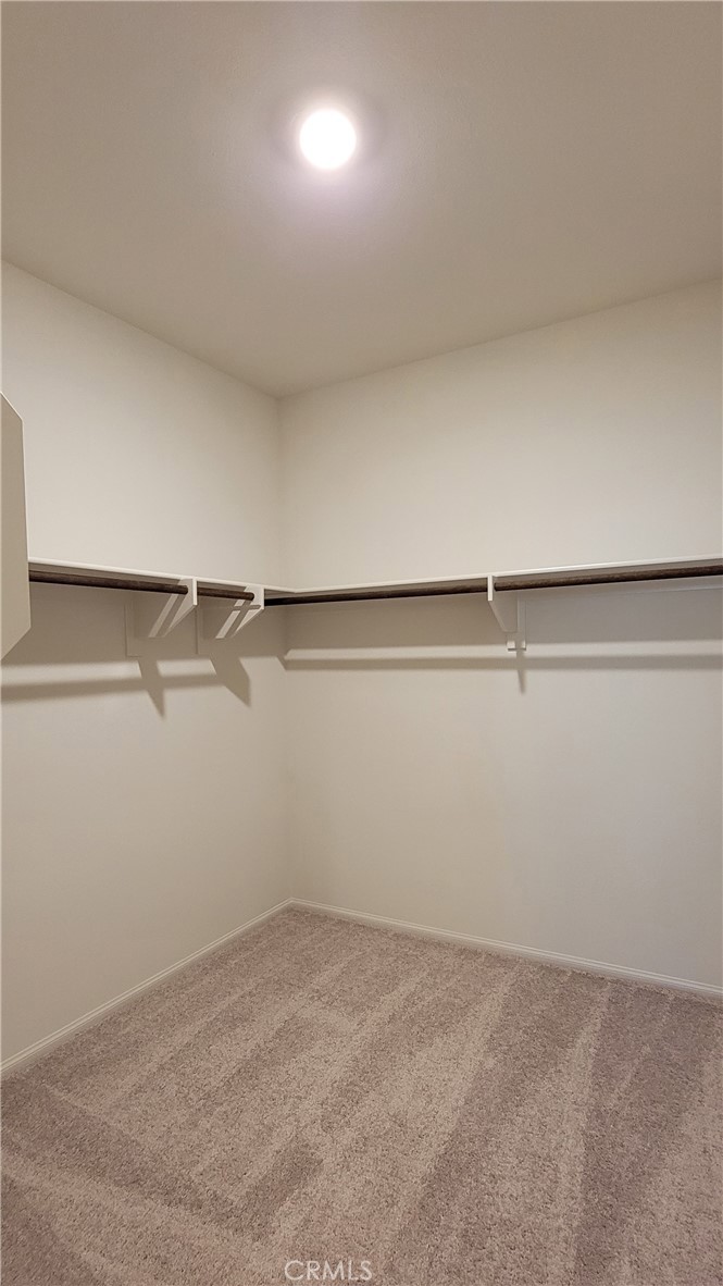 32916 Earlsburn Circle Menifee, CA 92584 - Photo 20 of 34 a view of small space with racks on the wall