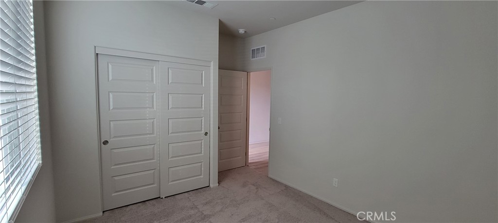 32916 Earlsburn Circle Menifee, CA 92584 - Photo 5 of 34 a view of walk in closet