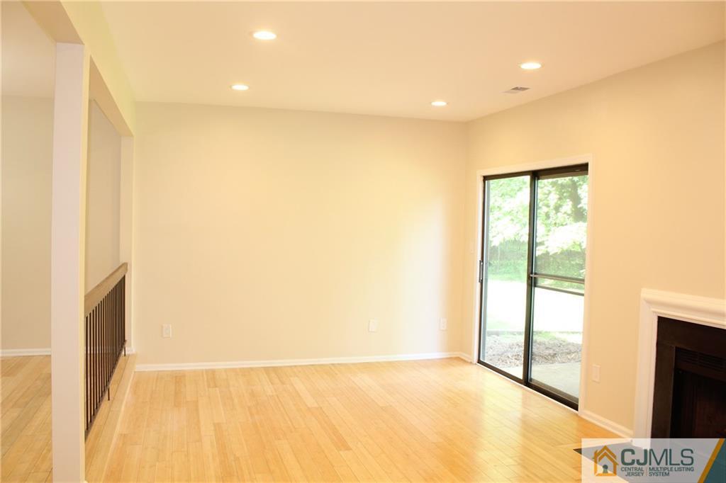 903 Timber Oaks Road, Unit 903 Edison, NJ 08820 - Photo 11 of 34 a view of an empty room with a window
