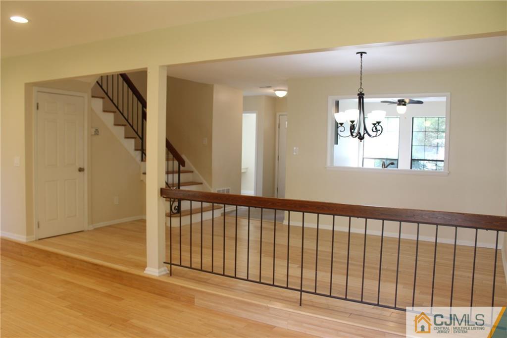 903 Timber Oaks Road, Unit 903 Edison, NJ 08820 - Photo 14 of 34 a view of a hallway with windows