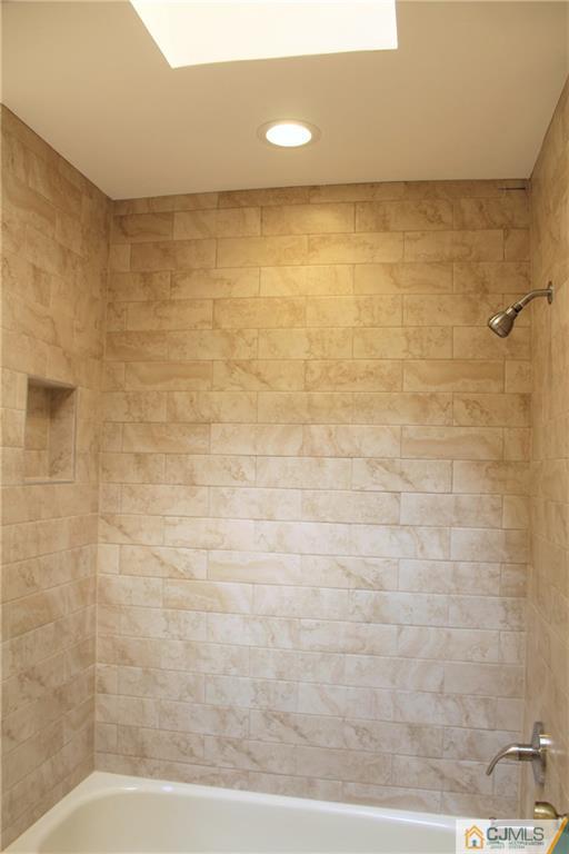 903 Timber Oaks Road, Unit 903 Edison, NJ 08820 - Photo 29 of 34 a bathroom with a shower