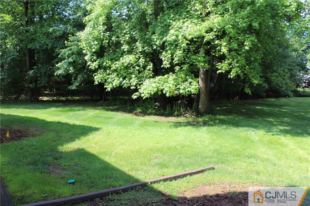 903 Timber Oaks Road, Unit 903 Edison, NJ 08820 - Photo 34 of 34 a view of a backyard
