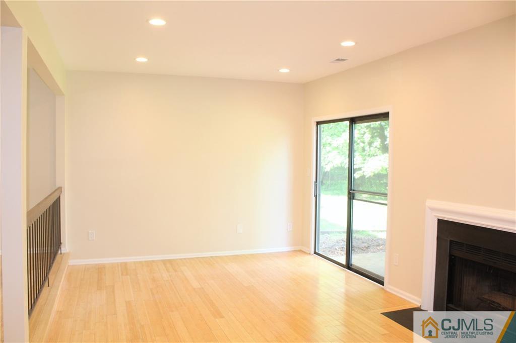903 Timber Oaks Road, Unit 903 Edison, NJ 08820 - Photo 10 of 34 a view of an empty room with a window