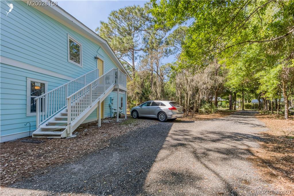 669 Southwest Linden Street Stuart, FL 34997 - Photo 34 of 43 GUEST HOME WITH PLENTY OF PARKING. STAIRS LEAD TO ONE LEVEL LIVING