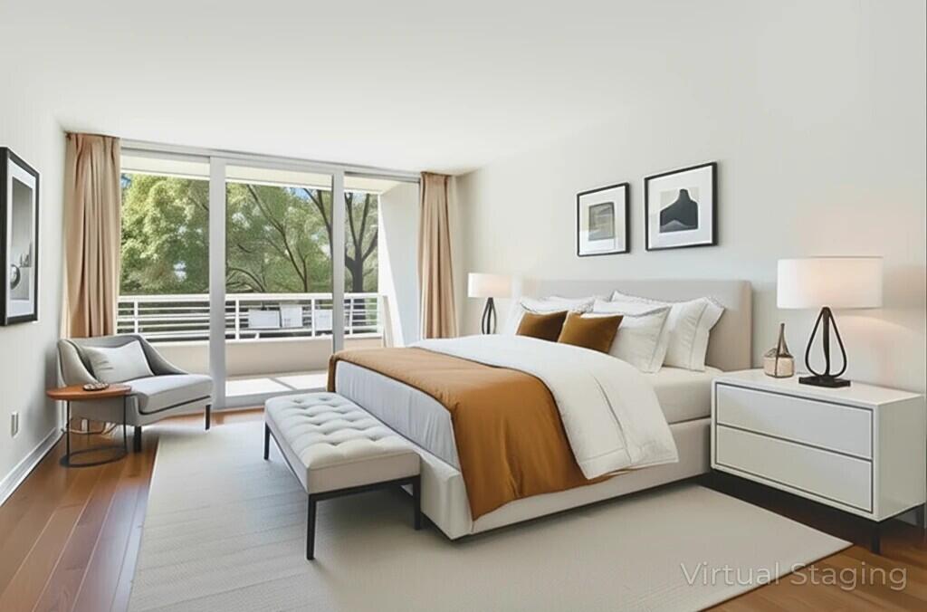 4201 North Ocean Boulevard, Unit 208 Boca Raton, FL 33431 - Photo 13 of 38 a bedroom with a bed and wooden floor