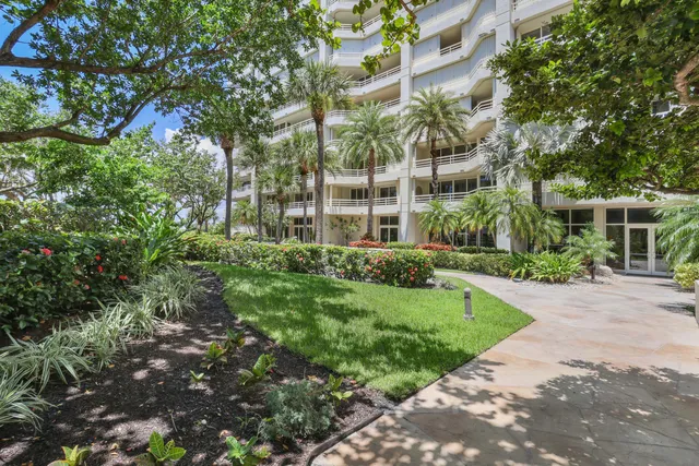 a view of a building with a garden