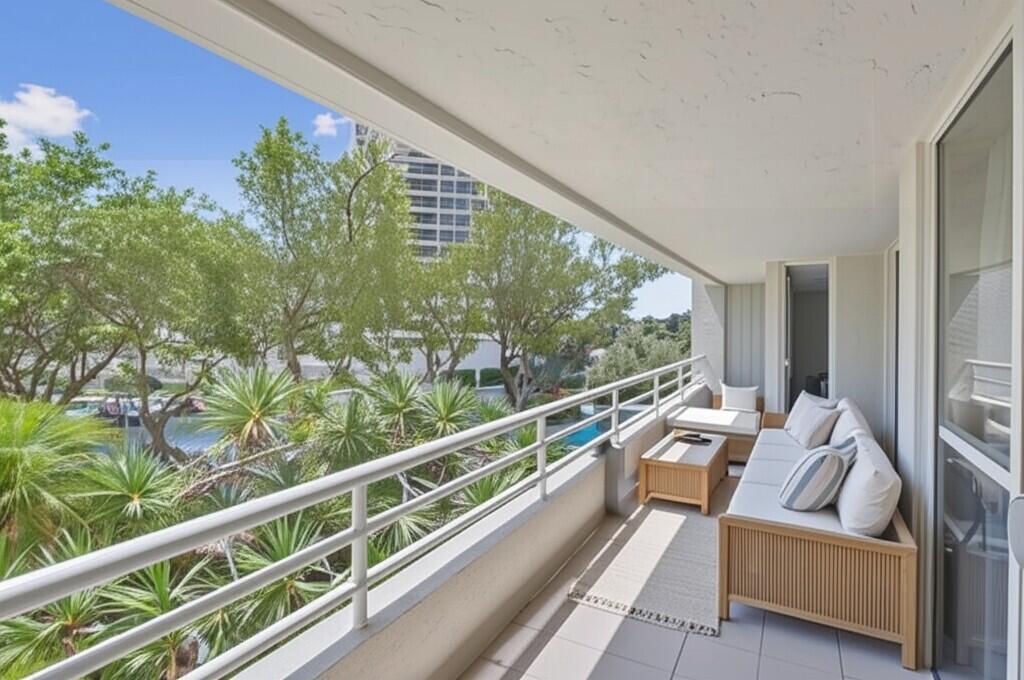 4201 North Ocean Boulevard, Unit 208 Boca Raton, FL 33431 - Photo 6 of 38 a view of two chairs in balcony