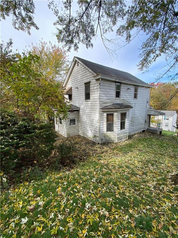 419 Maytide Street Pittsburgh, PA 15227 - Photo 1 of 28 a view of a house with a large window