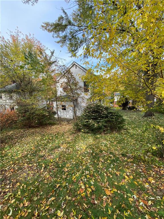 419 Maytide Street Pittsburgh, PA 15227 - Photo 21 of 28 a view of a large yard with plants and large trees