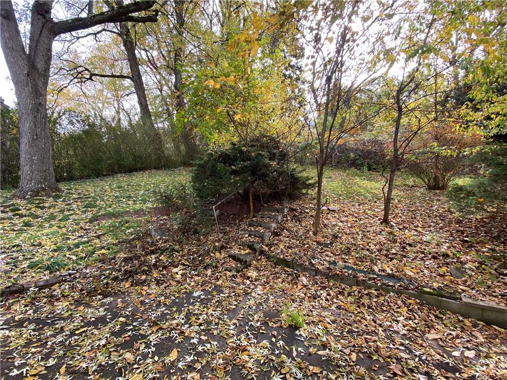 419 Maytide Street Pittsburgh, PA 15227 - Photo 22 of 28 a backyard of a house with lots of green space