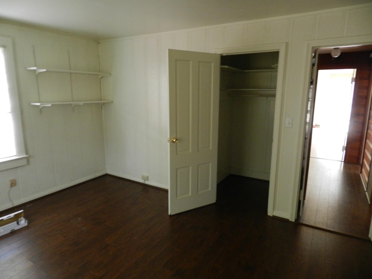 50 Katherine Avenue Salinas, CA 93901 - Photo 11 of 30 an empty room with wooden floor and windows
