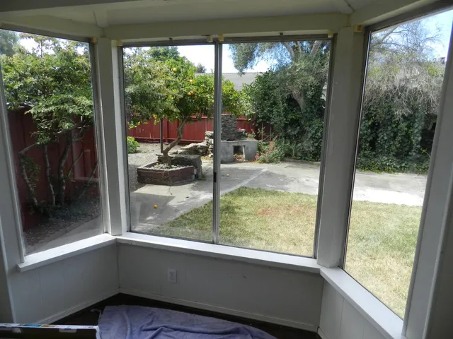 a view of backyard from balcony