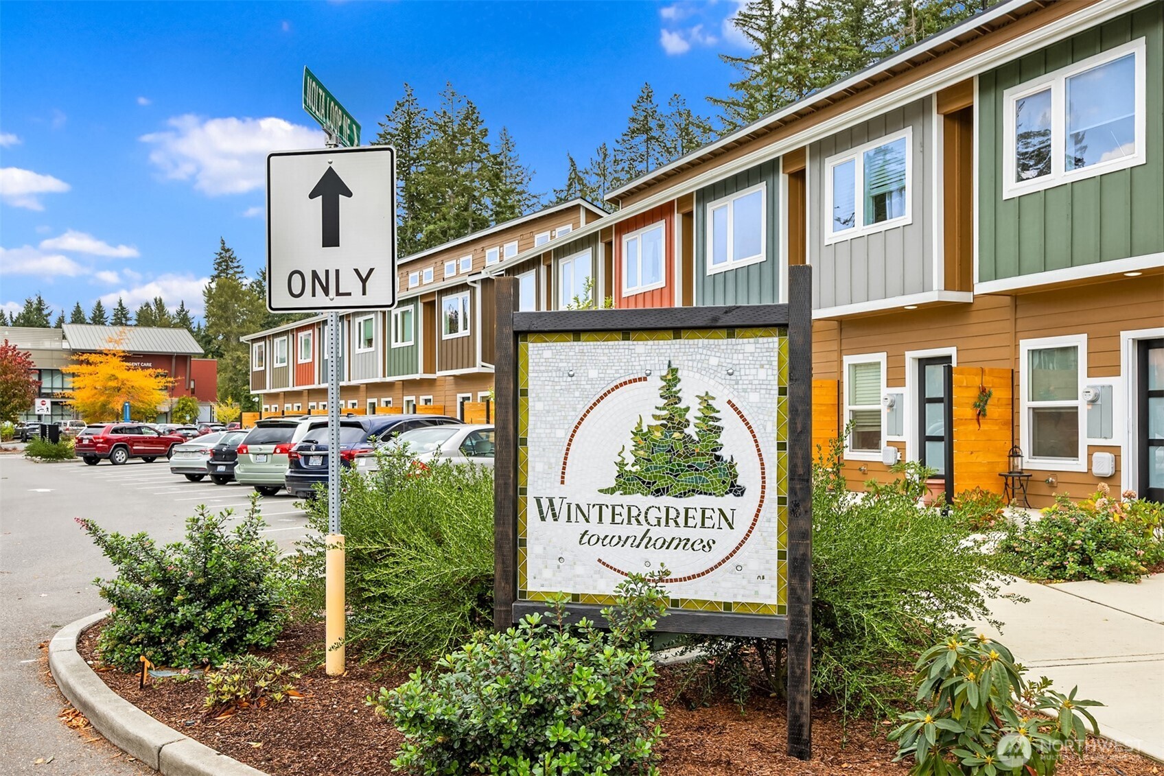 1359 Nolta Loop Northeast Bainbridge Island, WA 98110 - Photo 28 of 28 a sign on the side of a building