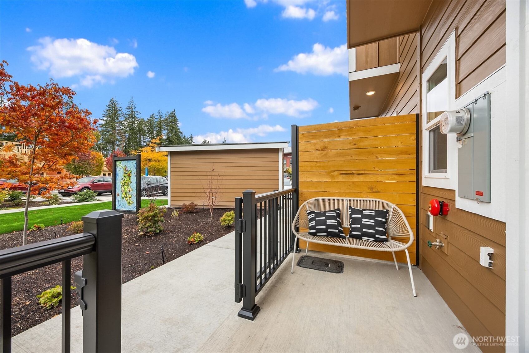 1359 Nolta Loop Northeast Bainbridge Island, WA 98110 - Photo 3 of 28 a view of a patio with a table and chairs