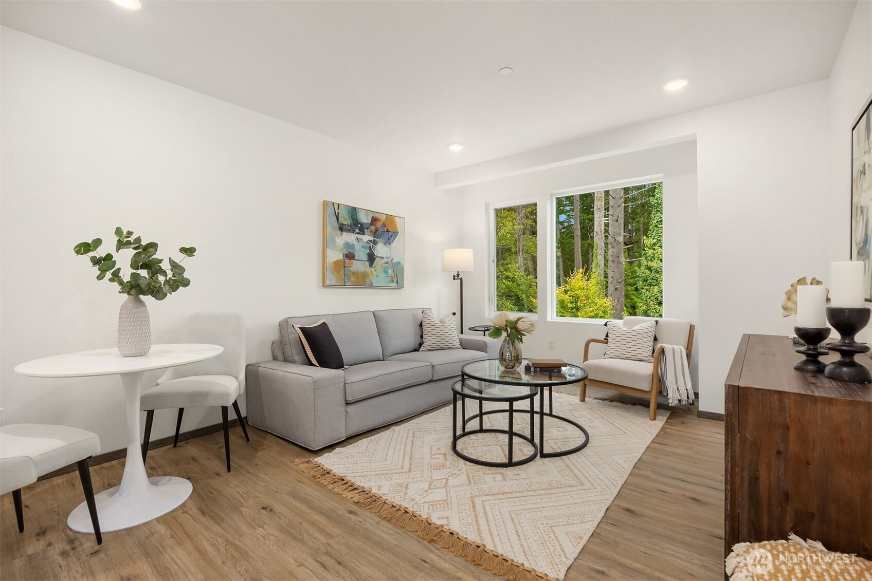1359 Nolta Loop Northeast Bainbridge Island, WA 98110 - Photo 6 of 28 a living room with furniture and a large window