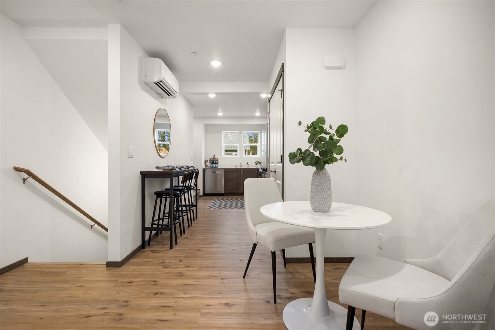 1359 Nolta Loop Northeast Bainbridge Island, WA 98110 - Photo 10 of 28 a view of a dining room with furniture and wooden floor