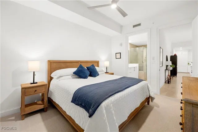 a bedroom with a bed and a view of bedroom