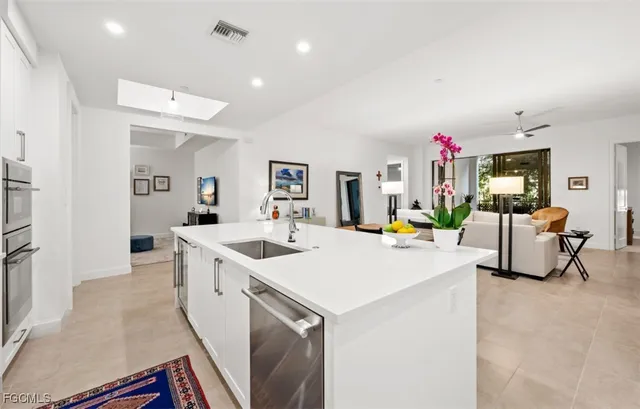 a view of living room and kitchen