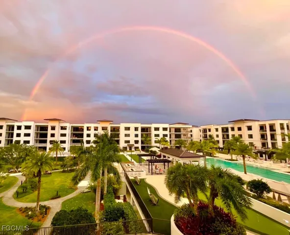 a view of a livingroom with furniture and flat screen tv
