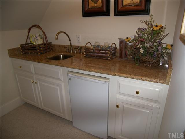 9528 Pippin Road Zebulon, NC 27597 - Photo 11 of 12 wet bar in bonus room