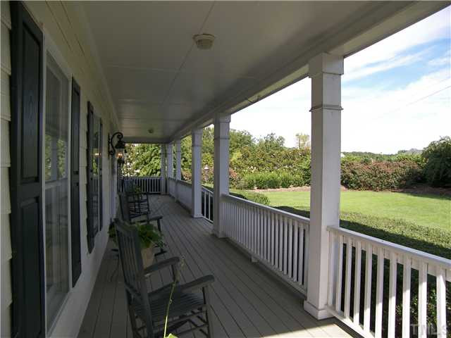 9528 Pippin Road Zebulon, NC 27597 - Photo 5 of 12 Wide front porch - kick back