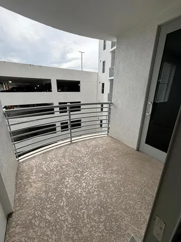 a view of a swimming pool with an ocean view