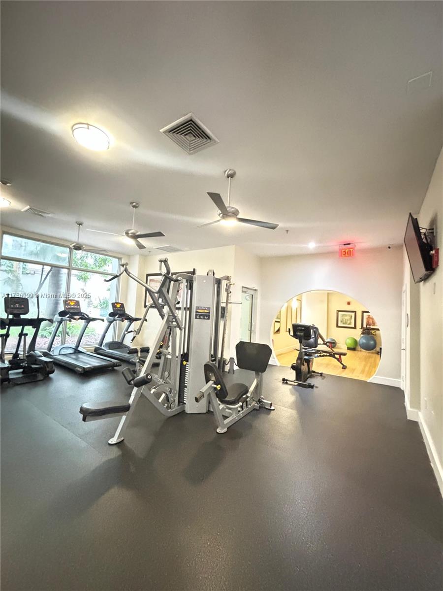 1830 Radius Drive, Unit 604 Hollywood, FL 33020 - Photo 20 of 22 a view of a room with gym equipment