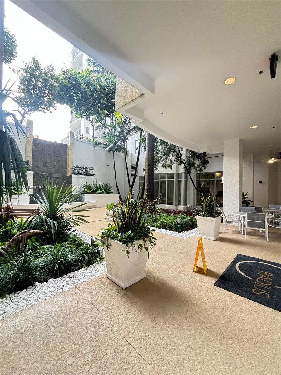 1830 Radius Drive, Unit 604 Hollywood, FL 33020 - Photo 3 of 22 a view of swimming pool with outdoor seating and plants