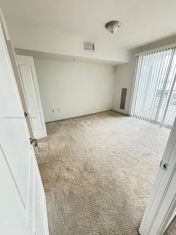 a view of a room with a fireplace