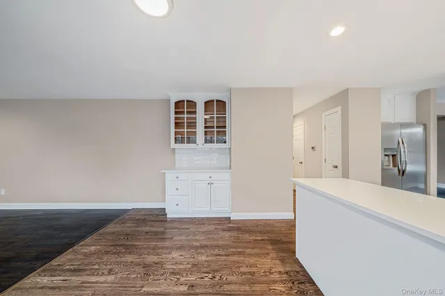 a view of a kitchen with a sink