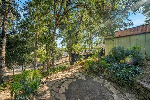 a view of backyard with green space