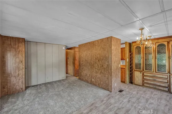 a kitchen with stainless steel appliances granite countertop a sink and a refrigerator
