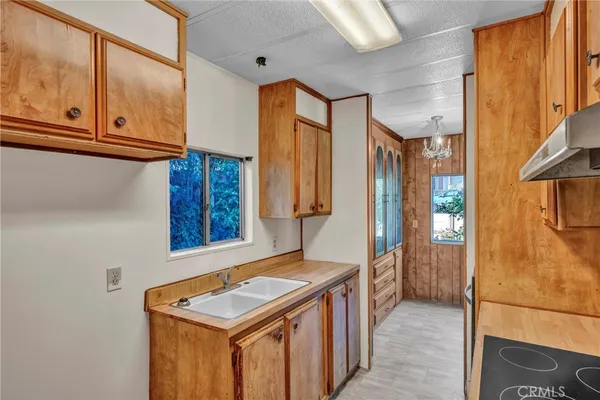 a view of walk in closet with window