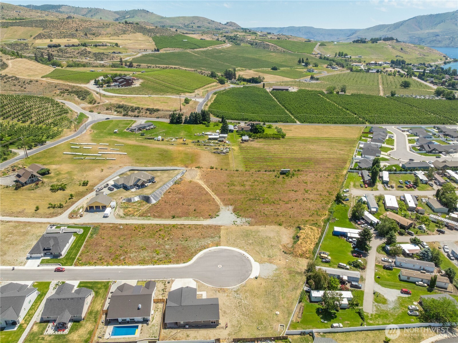 58 Sailing Hawk Lane Manson, WA 98831 - Photo 15 of 36 an aerial view of residential houses with outdoor space