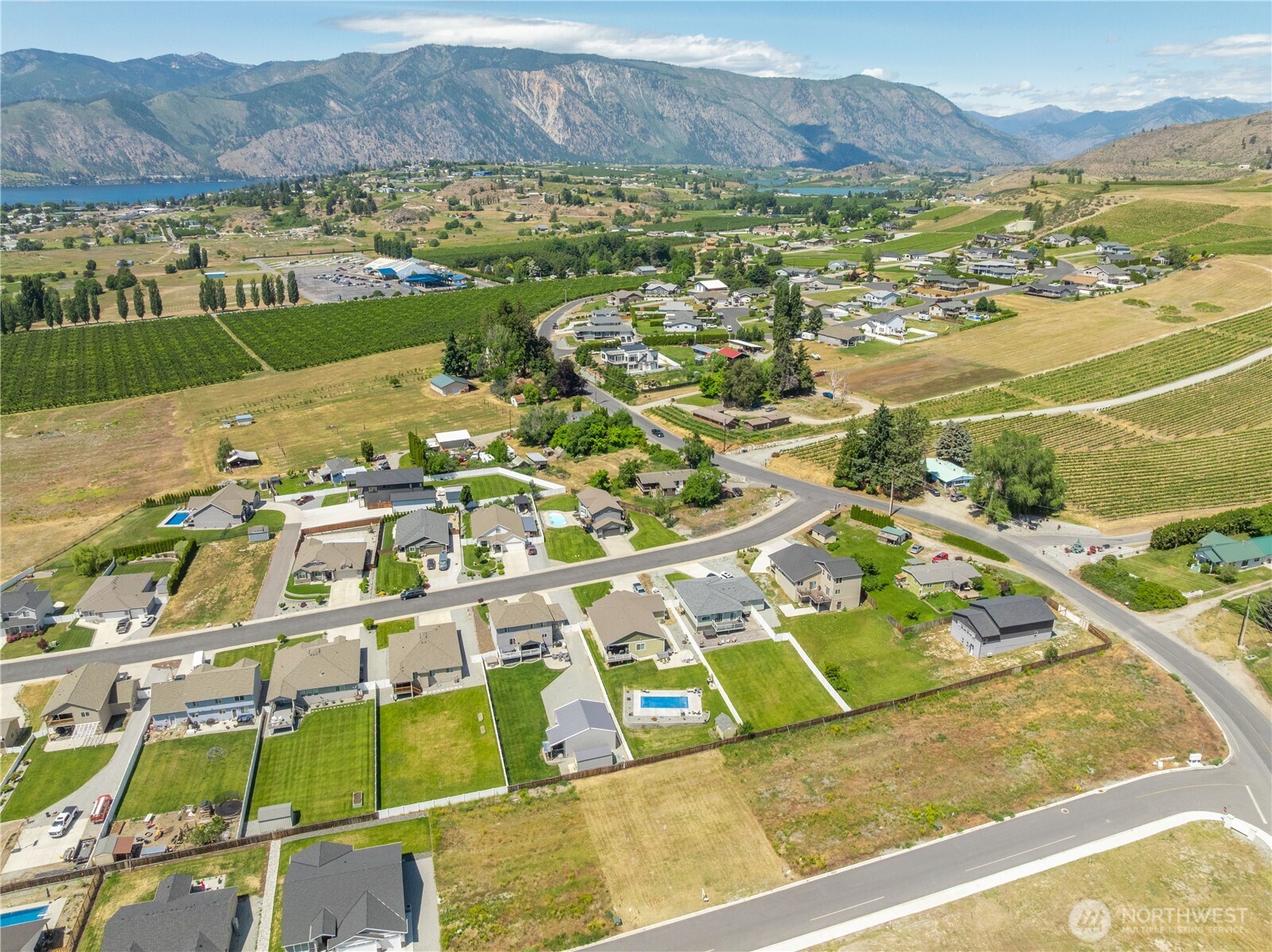 58 Sailing Hawk Lane Manson, WA 98831 - Photo 16 of 36 a view of a city with a mountain