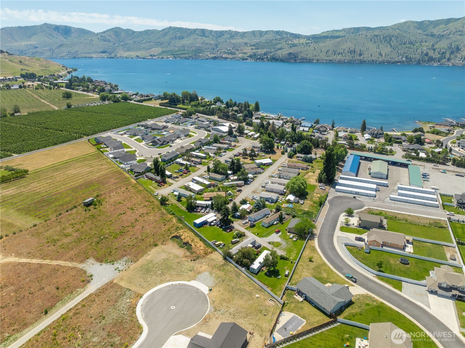 58 Sailing Hawk Lane Manson, WA 98831 - Photo 17 of 36 an aerial view of a house with a lake view