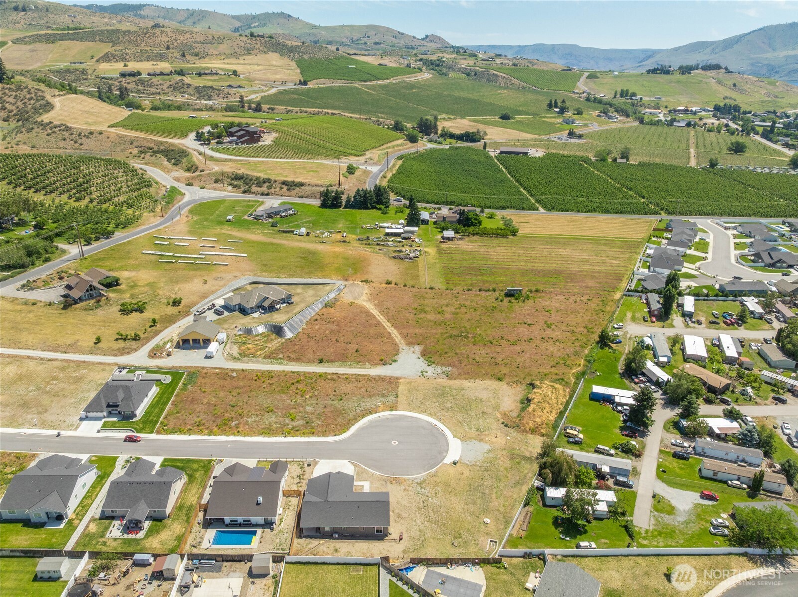58 Sailing Hawk Lane Manson, WA 98831 - Photo 25 of 36 an aerial view of residential houses with outdoor space