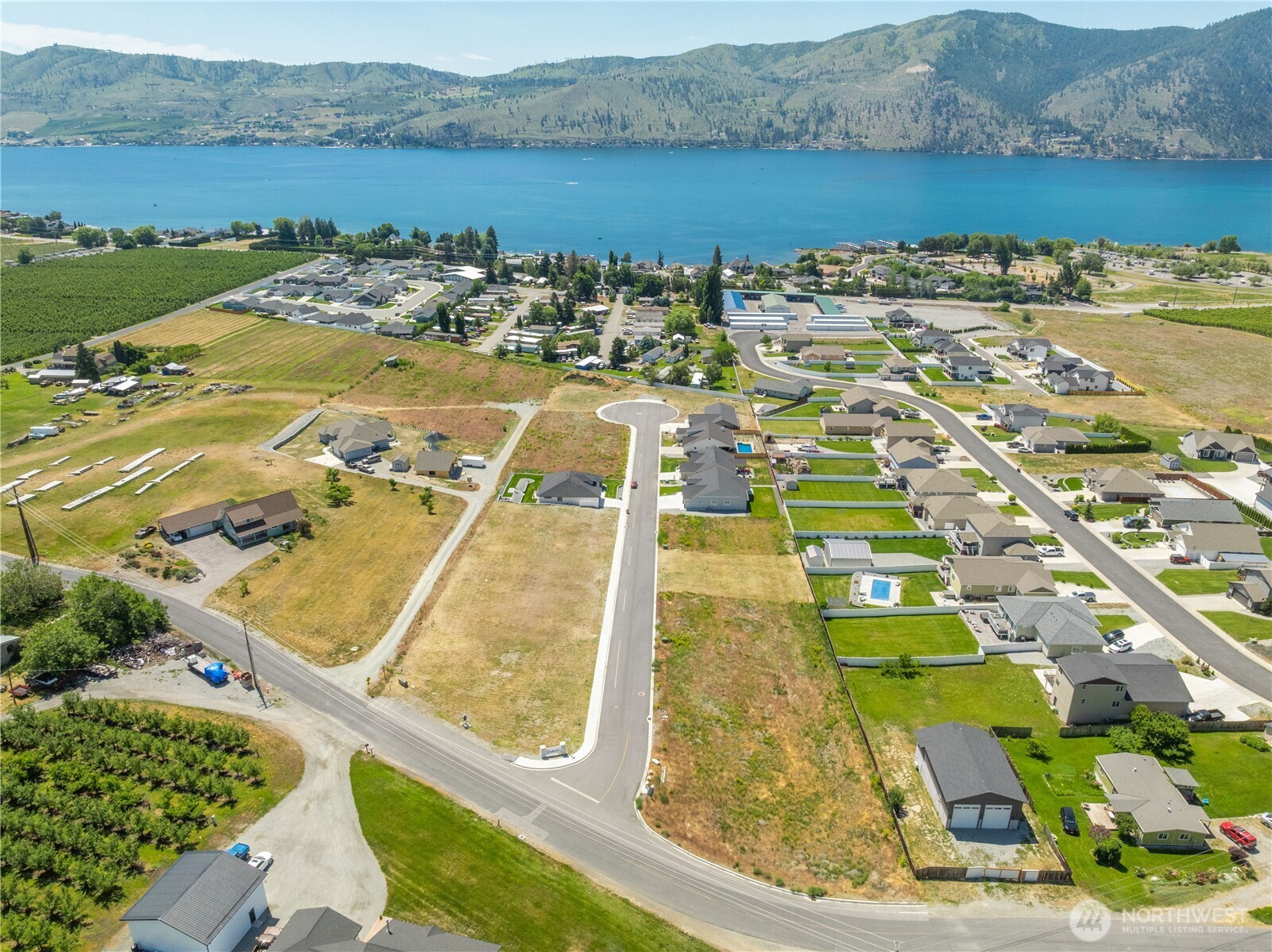 58 Sailing Hawk Lane Manson, WA 98831 - Photo 27 of 36 an aerial view of a pool